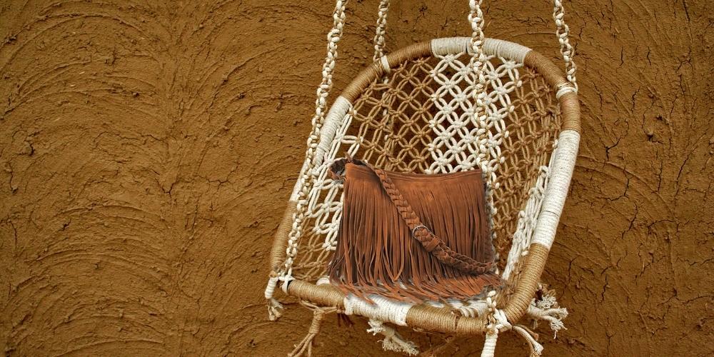 brown fringed bag